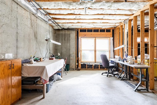 office area with concrete floors