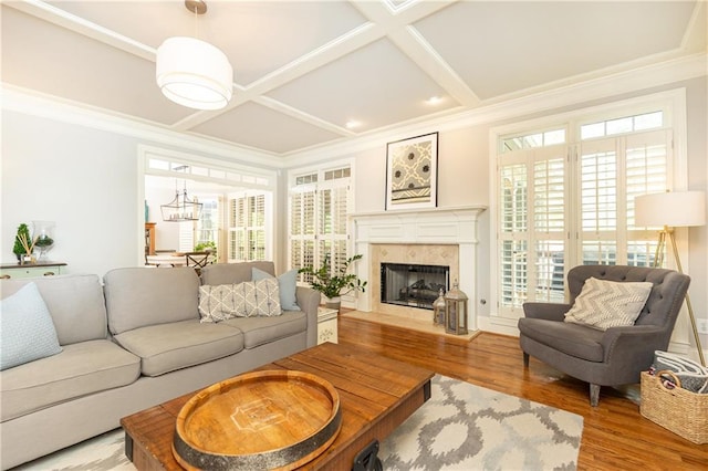 3110 Dickson St NE, Brookhaven, GA 30319 - living area featuring coffered ceiling, wood finished floors, healthy amount of natural light, a fireplace, and beamed ceiling