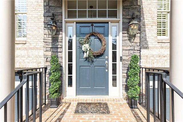 3110 Dickson St NE, Brookhaven, GA 30319 - doorway to property with stone siding and a porch