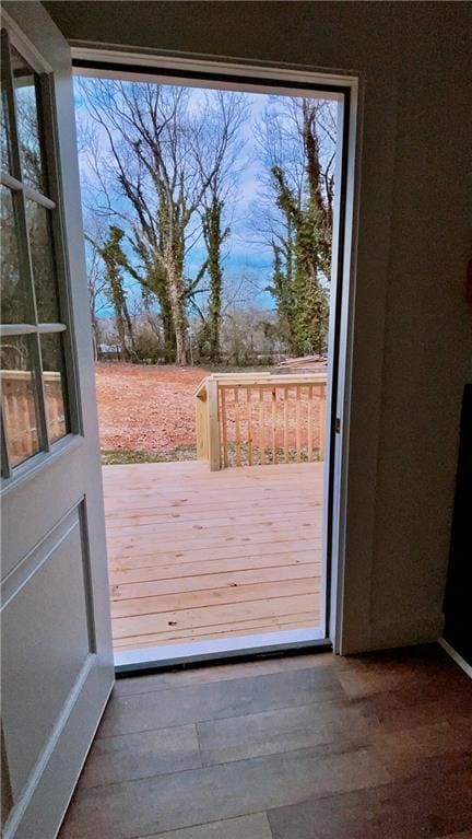 entryway with wood finished floors