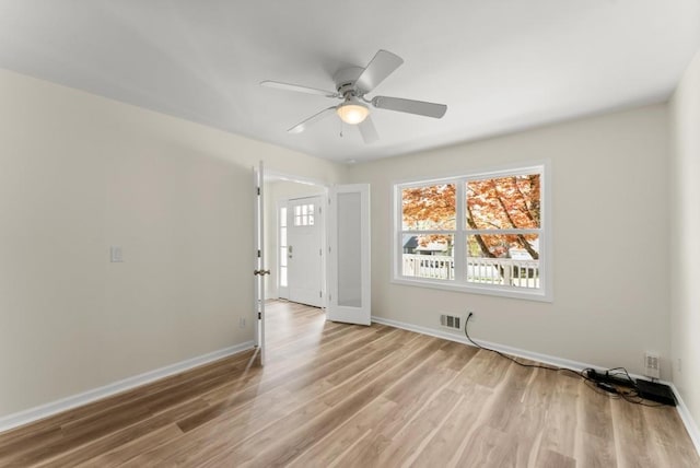 385 Jayne Ellen Way, Alpharetta, GA 30009 - spare room featuring light wood-type flooring, baseboards, and a ceiling fan