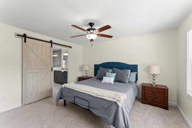 385 Jayne Ellen Way, Alpharetta, GA 30009 - bedroom with a barn door, carpet flooring, baseboards, and ceiling fan