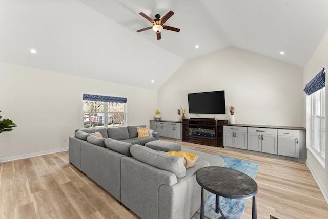 385 Jayne Ellen Way, Alpharetta, GA 30009 - living room featuring lofted ceiling, ceiling fan, light wood-type flooring, recessed lighting, and baseboards