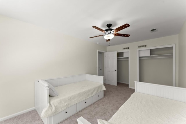 385 Jayne Ellen Way, Alpharetta, GA 30009 - carpeted bedroom featuring baseboards, multiple closets, and ceiling fan