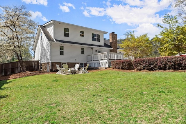 385 Jayne Ellen Way, Alpharetta, GA 30009 - rear view of property with a chimney, a deck, an outdoor fire pit, and brick siding