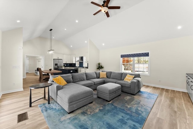 385 Jayne Ellen Way, Alpharetta, GA 30009 - living area featuring ceiling fan, light wood-style floors, high vaulted ceiling, baseboards, and recessed lighting