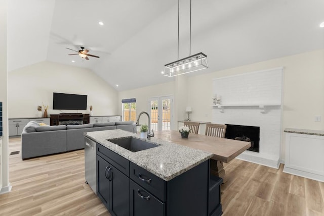 385 Jayne Ellen Way, Alpharetta, GA 30009 - kitchen with a sink, open floor plan, a ceiling fan, vaulted ceiling, and dishwasher