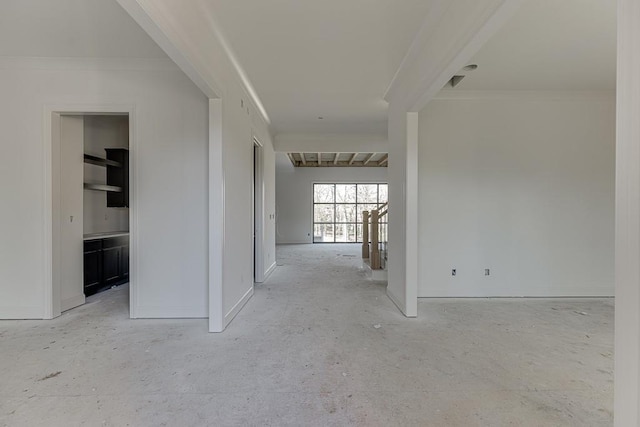 corridor featuring crown molding