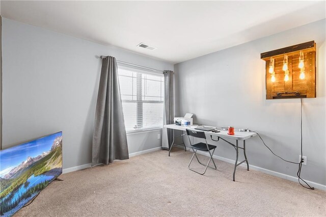 bedroom featuring ceiling fan and light carpet