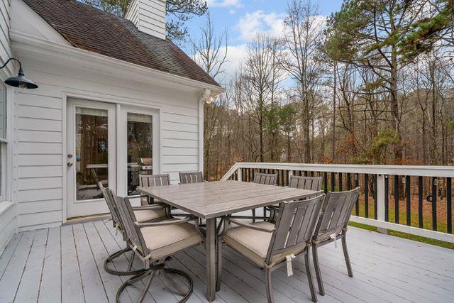 deck featuring outdoor dining area