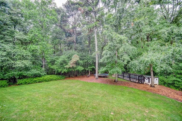 view of yard featuring a trampoline