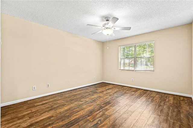 98 Hampshire Ct, Avondale Estates, GA 30002 - empty room featuring dark wood-type flooring, a ceiling fan, a textured ceiling, and baseboards