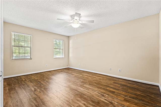 98 Hampshire Ct, Avondale Estates, GA 30002 - spare room with ceiling fan, dark wood-type flooring, a textured ceiling, and baseboards