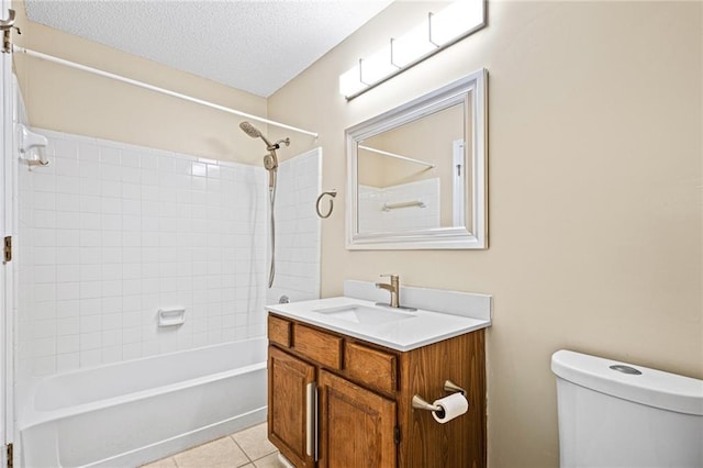 98 Hampshire Ct, Avondale Estates, GA 30002 - bathroom featuring shower / bath combination, vanity, toilet, tile patterned flooring, and a textured ceiling