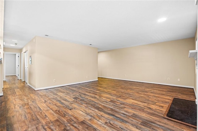 98 Hampshire Ct, Avondale Estates, GA 30002 - empty room featuring dark wood-style flooring and baseboards