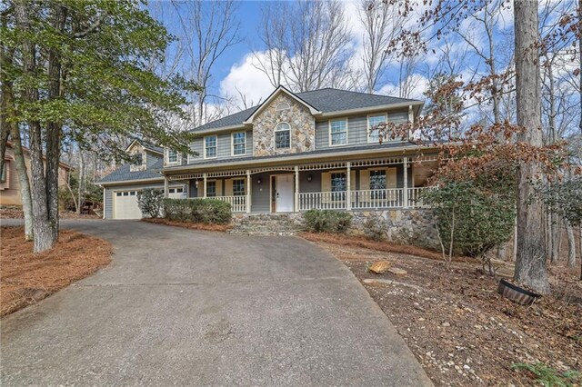 view of front of property featuring a garage