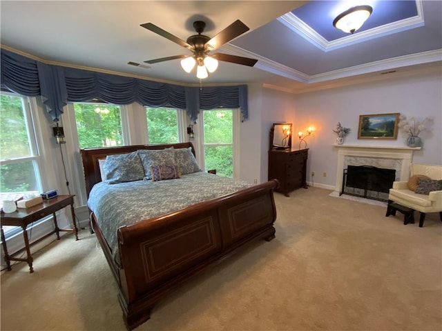 5440 Cameron Forest Pkwy, Johns Creek, GA 30022 - bedroom with light colored carpet, a high end fireplace, ornamental molding, and a ceiling fan