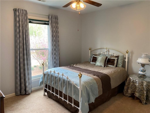5440 Cameron Forest Pkwy, Johns Creek, GA 30022 - carpeted bedroom featuring multiple windows and a ceiling fan