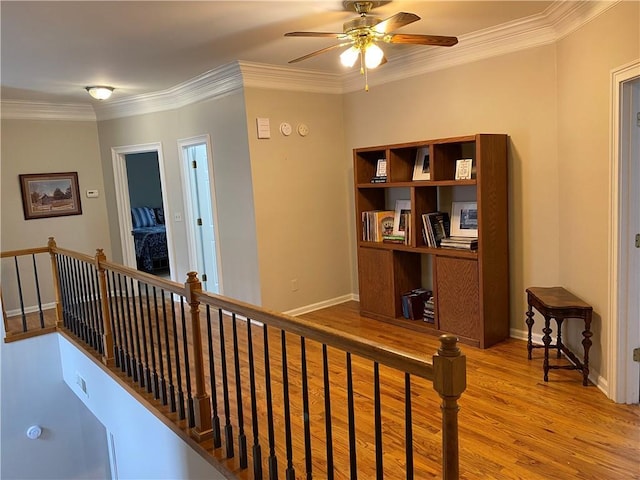 5440 Cameron Forest Pkwy, Johns Creek, GA 30022 - hallway with an upstairs landing, light wood-type flooring, and ornamental molding