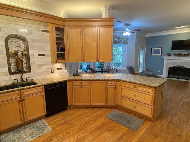 5440 Cameron Forest Pkwy, Johns Creek, GA 30022 - kitchen featuring dishwasher, a peninsula, light stone counters, ornamental molding, and open floor plan