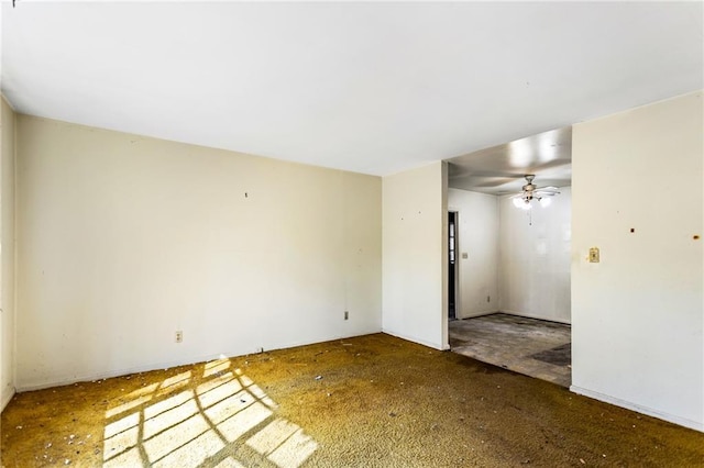 spare room with a ceiling fan