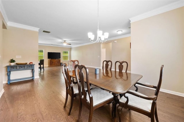 110 Collingwood Lndg, Covington, GA 30016 - dining space featuring wood finished floors, a chandelier, ornamental molding, and a ceiling fan