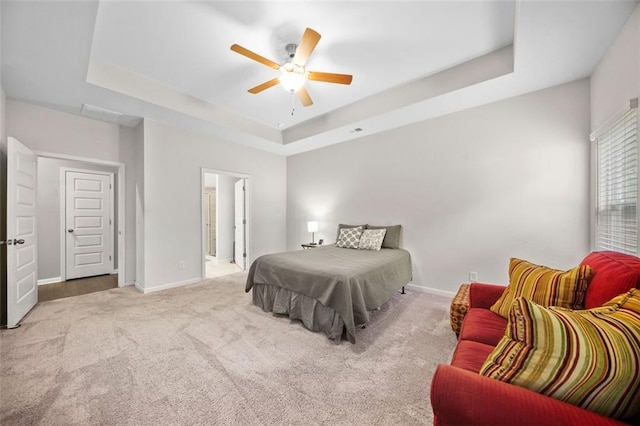 110 Collingwood Lndg, Covington, GA 30016 - bedroom with a raised ceiling, carpet, a ceiling fan, and ensuite bath
