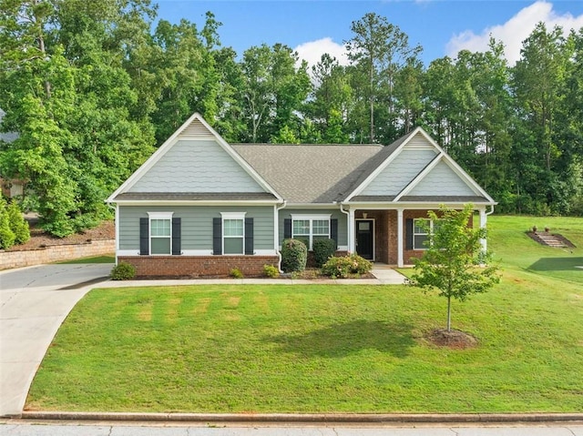 110 Collingwood Lndg, Covington, GA 30016 - craftsman inspired home featuring a front lawn and brick siding