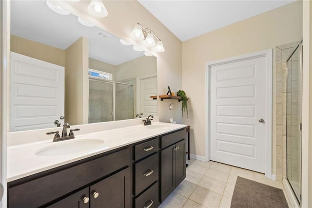 110 Collingwood Lndg, Covington, GA 30016 - bathroom with a stall shower, double vanity, and tile patterned floors