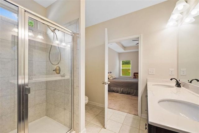 110 Collingwood Lndg, Covington, GA 30016 - ensuite bathroom featuring double vanity, a shower stall, and tile patterned flooring