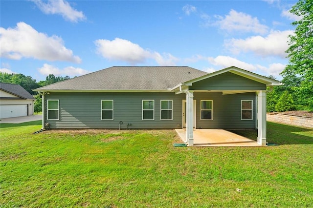110 Collingwood Lndg, Covington, GA 30016 - back of property featuring a patio area, a yard, and a shingled roof