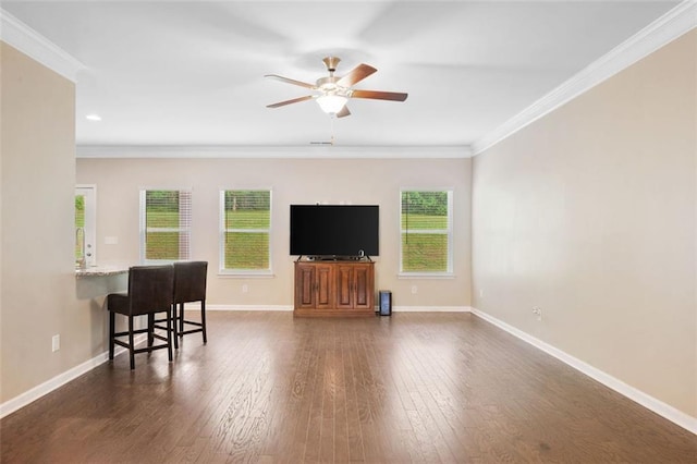 110 Collingwood Lndg, Covington, GA 30016 - living room featuring ornamental molding, ceiling fan, and dark wood-type flooring