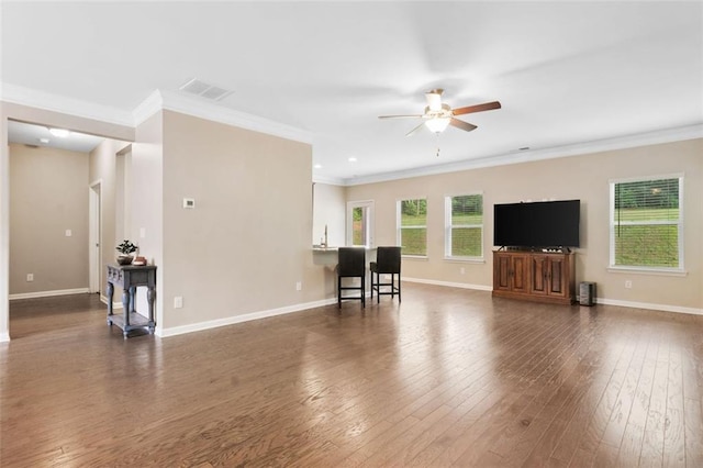 110 Collingwood Lndg, Covington, GA 30016 - living area featuring a ceiling fan, ornamental molding, and dark wood-type flooring