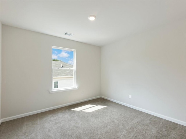 unfurnished room with carpet