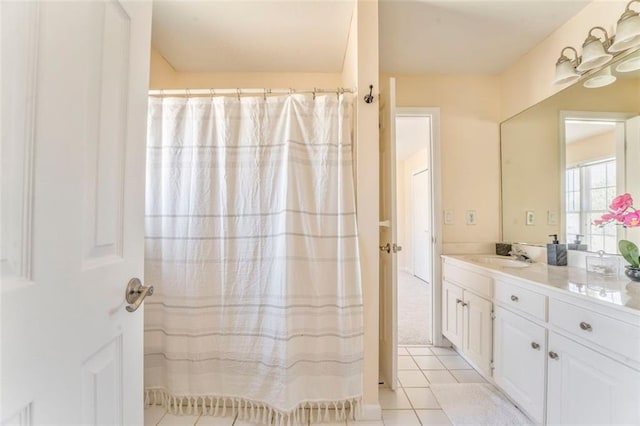 full bathroom with tile patterned flooring and vanity