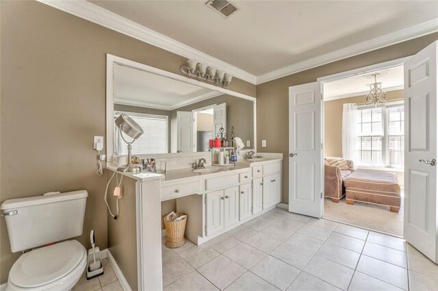 full bathroom with visible vents, ornamental molding, tile patterned flooring, a shower stall, and a sink