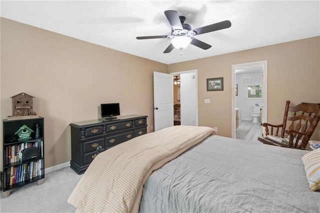 3012 Cypress Cv, Ball Ground, GA 30107 - bedroom with baseboards, ceiling fan, and connected bathroom
