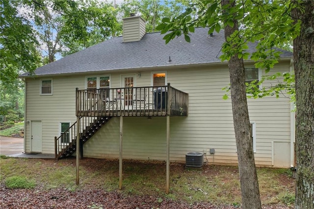 3012 Cypress Cv, Ball Ground, GA 30107 - back of house with stairway, a chimney, central AC unit, a deck, and a shingled roof