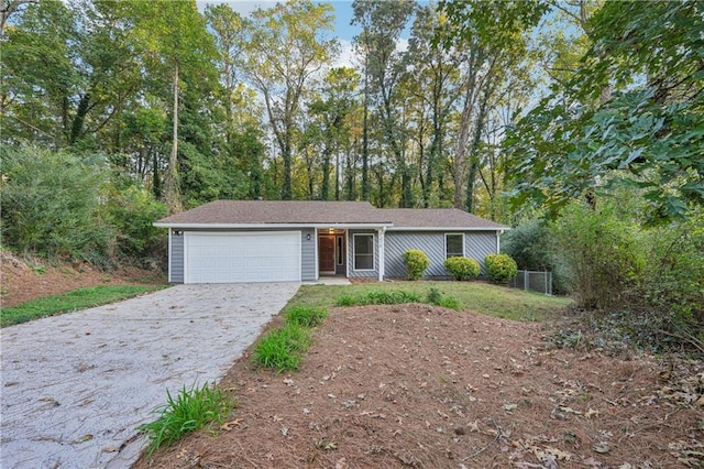 single story home featuring a garage