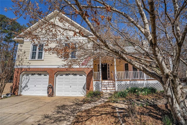 view of home's exterior with a garage, concrete driveway, and brick siding