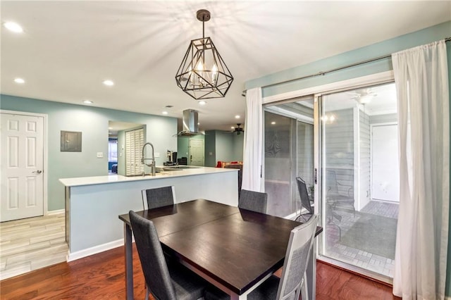 64 Devon Ln, Avondale Estates, GA 30002 - dining space with light wood-style floors, a chandelier, recessed lighting, and baseboards