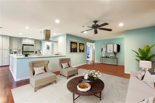 64 Devon Ln, Avondale Estates, GA 30002 - living room featuring a ceiling fan, wood finished floors, recessed lighting, and baseboards