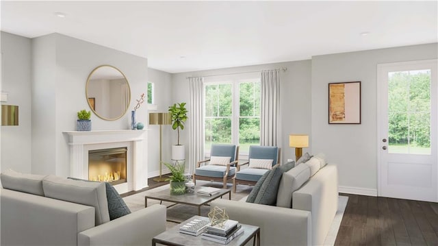 living room featuring dark wood-style floors, baseboards, and a glass covered fireplace