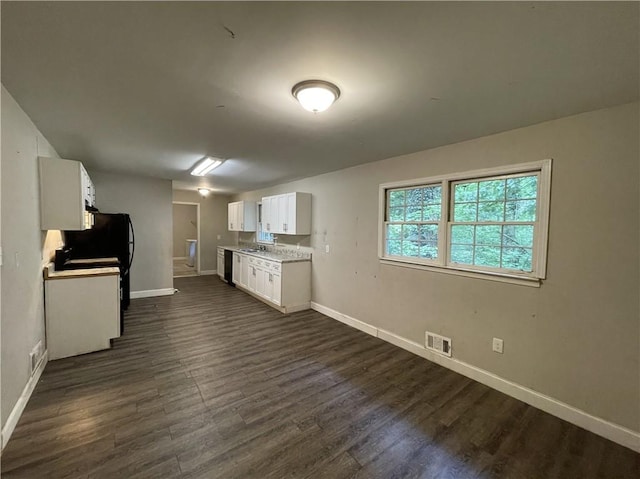 6106 Oak Hill Dr SW, Austell, GA 30168 - kitchen featuring baseboards, white cabinets, and dark wood-type flooring