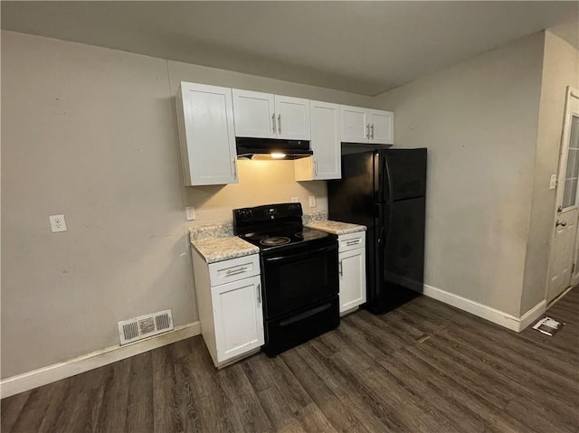 6106 Oak Hill Dr SW, Austell, GA 30168 - kitchen featuring black appliances, dark wood-type flooring, baseboards, and white cabinetry