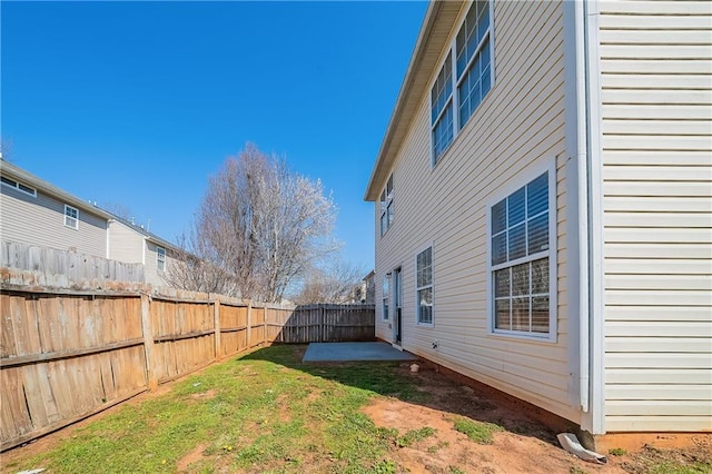 view of yard featuring a fenced backyard