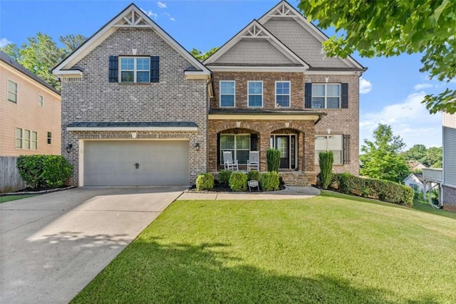 4022 Roberts Crest Dr, Suwanee, GA 30024 - craftsman house featuring covered porch, brick siding, concrete driveway, and a front yard