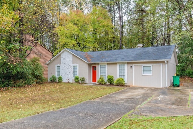 single story home with a front yard