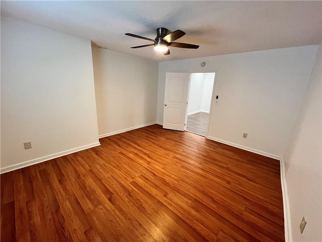 701 Cameron M Alexander Blvd NW, Atlanta, GA 30318 - spare room featuring ceiling fan, wood finished floors, and baseboards