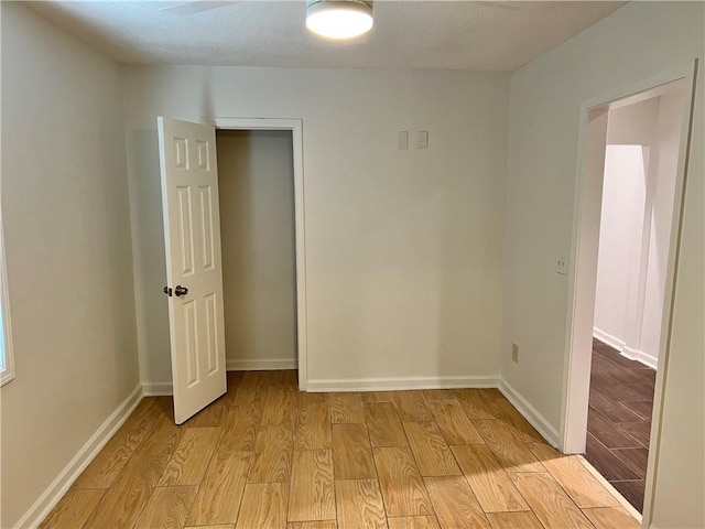 701 Cameron M Alexander Blvd NW, Atlanta, GA 30318 - empty room with light wood finished floors and baseboards